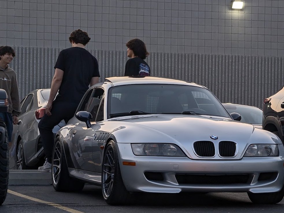 A silver BMW Z3 M Coupe at a car meet.